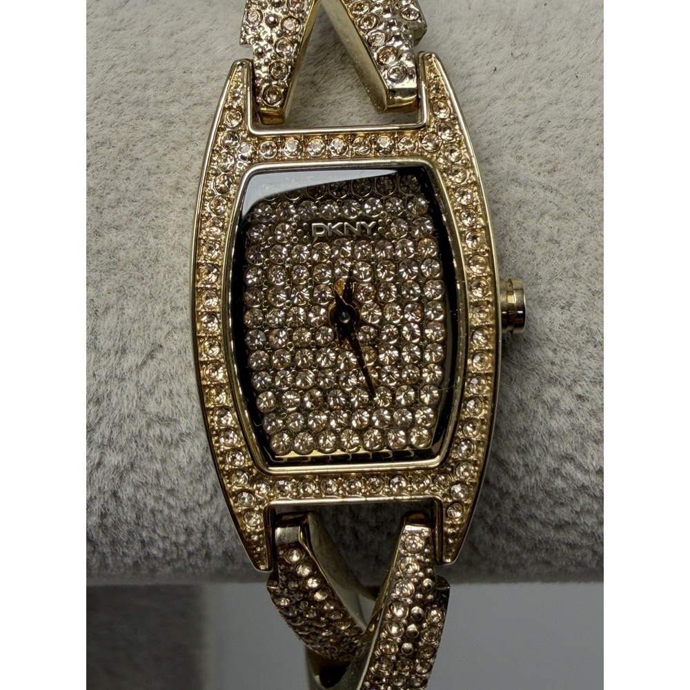 DKNY NY-8682 New Battery Ladies Watch 17MM 7.25" Gold Tone Crystals
